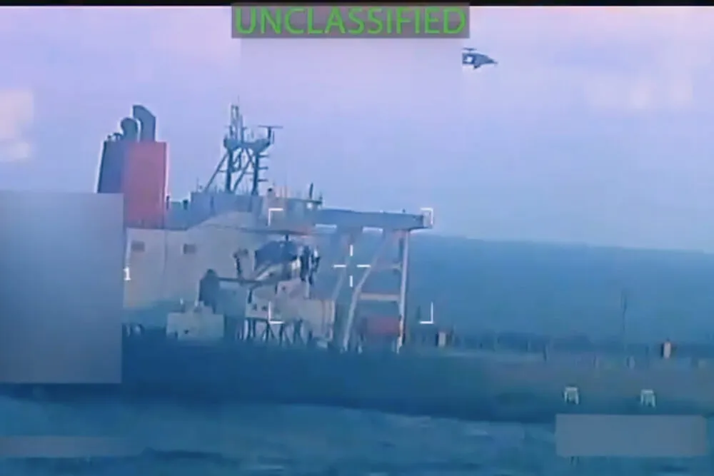 This image from video posted on Attorney General Pam Bondi’s X account, and partially redacted by the source, shows an oil tanker being seized by U.S. forces off the coast of Venezuela, Wednesday, Dec. 10, 2025.