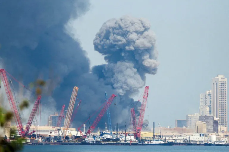 Smoke rises in the sky after blasts were heard in Manama, Bahrain, on Saturday, February 28, 2026