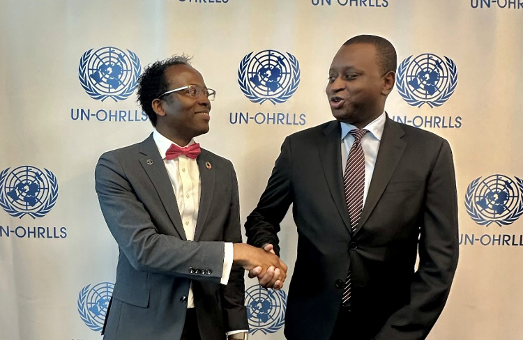 Landry Signé and Abdoul Salam Bello.