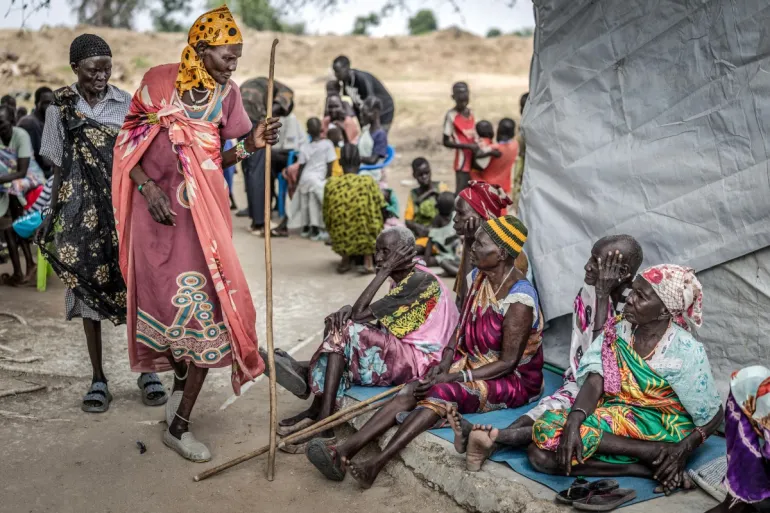 Elderly members of the Nuer community, uprooted by the conflict in Jonglei State, attend a community health session amid shortages of medical supplies in the POC IDP Camp in Bor, Jonglei State, on February 16, 2026