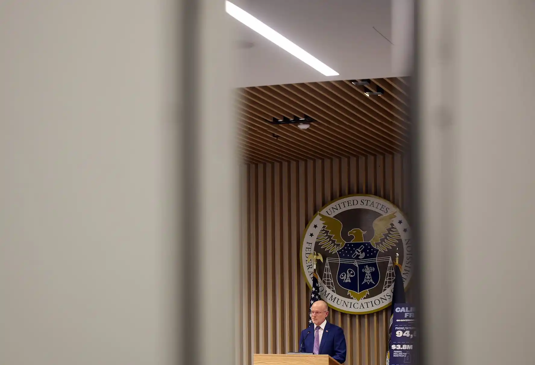 Chairman of the Federal Communications Commission (FCC) Brendan Carr speaks at a news conference following an FCC meeting at the Federal Communications Commission headquarters on February 18, 2026 in Washington, DC.