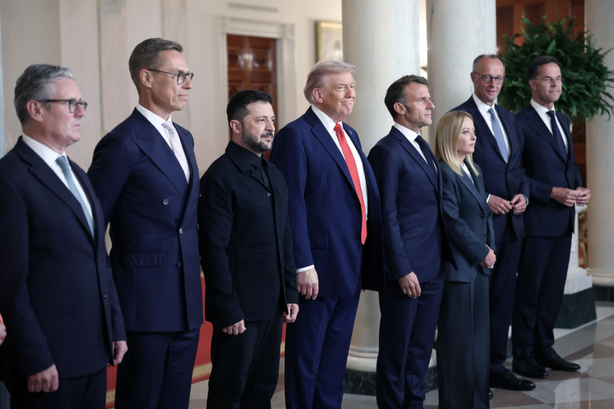 U.S. President Donald Trump and Ukrainian President Volodymyr Zelensky pose for a picture with European leaders following a meeting in the Oval Office at the White House on August 18, 2025 in Washington, D.C.