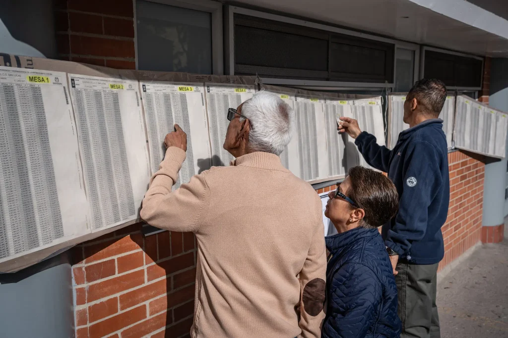 Voters checking their polling locations in Bogotá. Nathalia Angarita for The New York Times
